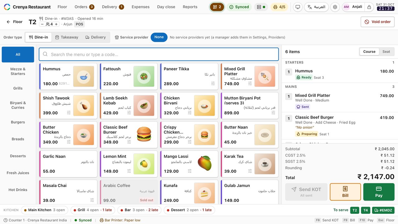 The crenya restaurant till taking an order for table T2: the menu in English and Arabic on the left, the order by course on the right with each item's kitchen status, and a ₹2,147 total with CGST and SGST